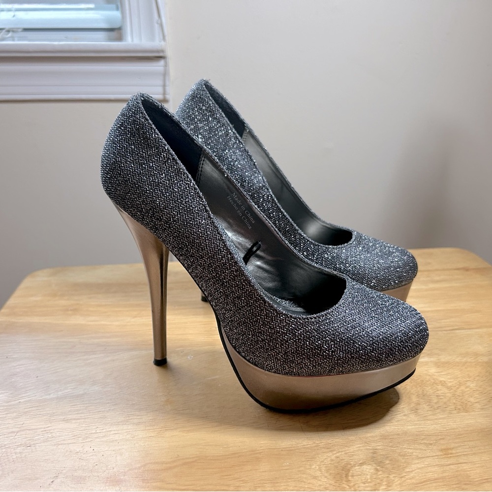 Black glitter stiletto pumps. Size 7.